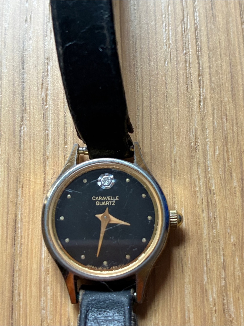 Vintage Quartz Women's Black and Gold Dress Watch by Bulova